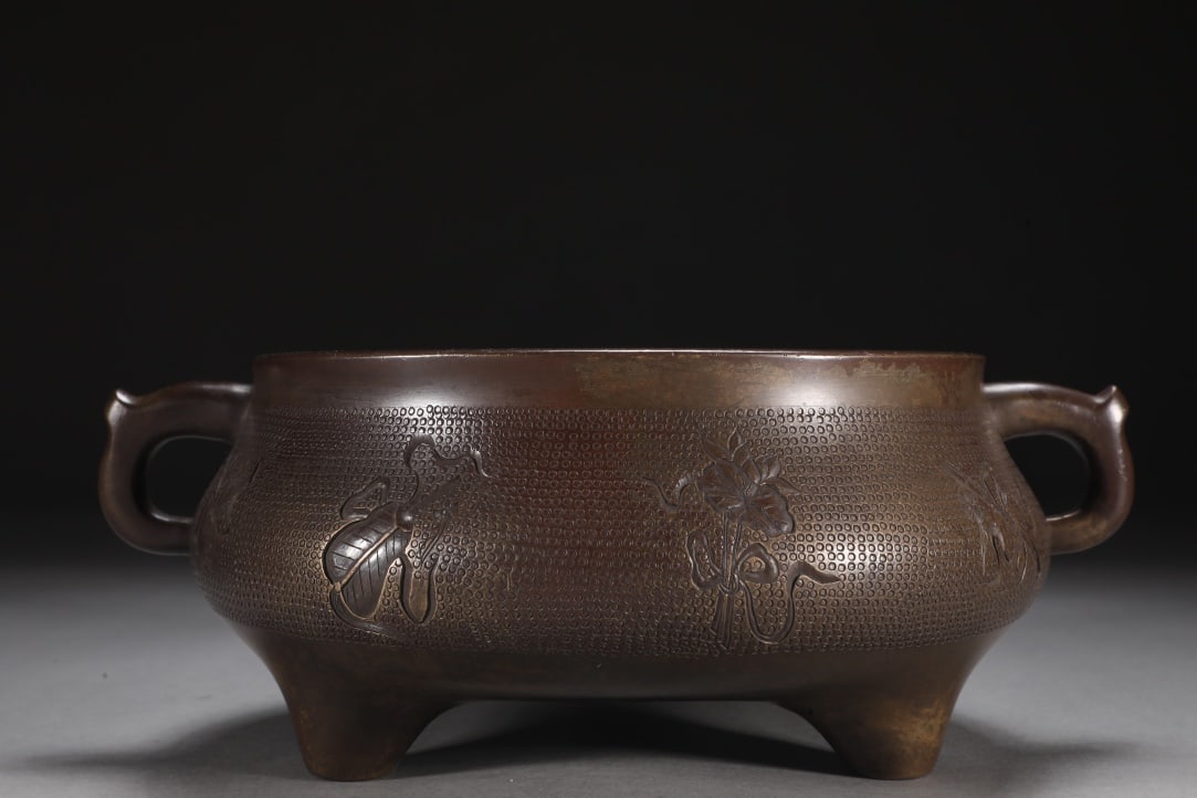 An Exquisite Bronze Eight Treasures Pattern Double-Ears and Tripod Censer (1 of 9)
