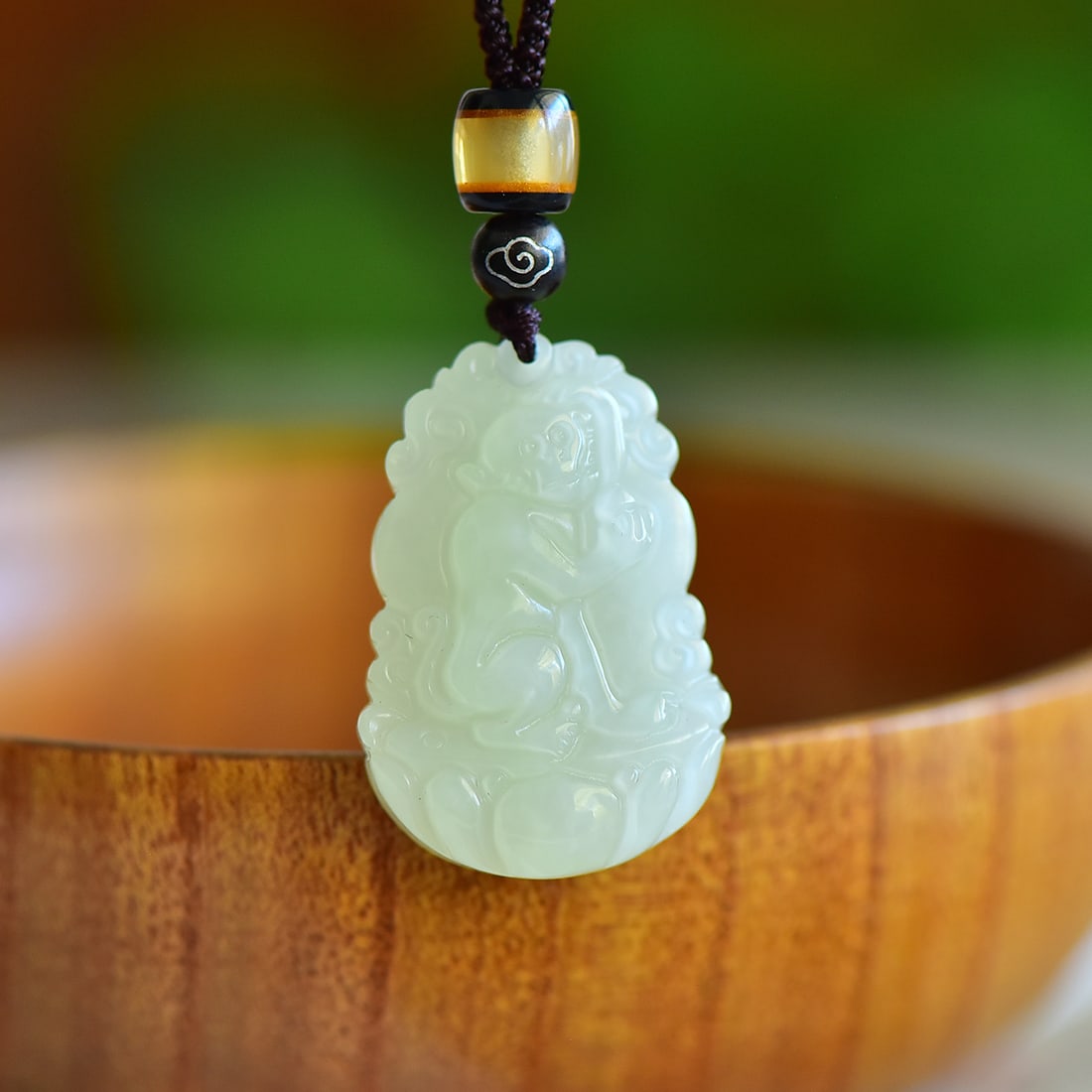 An Exquisite Greenish Jade Monkey Pattern Pendant (1 of 5)