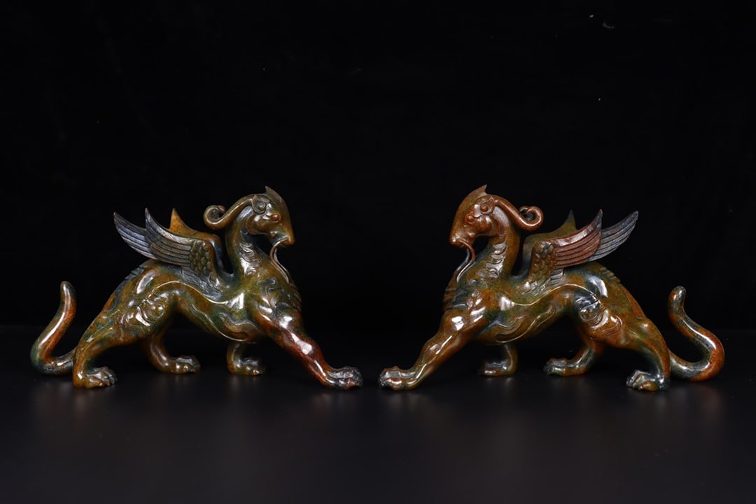 A pair of Exquisite Hetian Jade Auspicious Beast Ornament: A pair of Exquisite Hetian Jade Auspicious Beast Ornament,Han Dynasty, China,Size:11inx3.9inx6.5in,Weight:1862g 