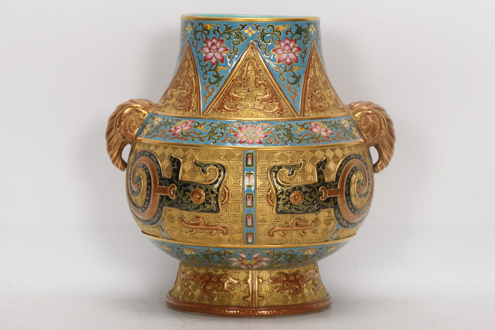 A Exquisite Famille-Rose Gilt Double-Ears Vase: A Exquisite Famille-Rose Gilt Double-Ears Vase,Qing Dynasty, China,Qianlong Six-character Mark,Size:8.9inx4.1inx8.9inx5.1in 