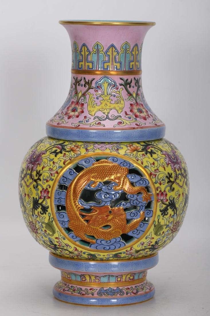 A Exquisite Famille-Rose Yellow-Ground Hollowed-Out Gilt Dragon-Pattern Vase: A Exquisite Famille-Rose Yellow-Ground Hollowed-Out Gilt Dragon-Pattern Vase,Qing Dynasty, China,Qianlong Four-character Mark,Size:14.1inx3.5inx6.2inx3.9in 