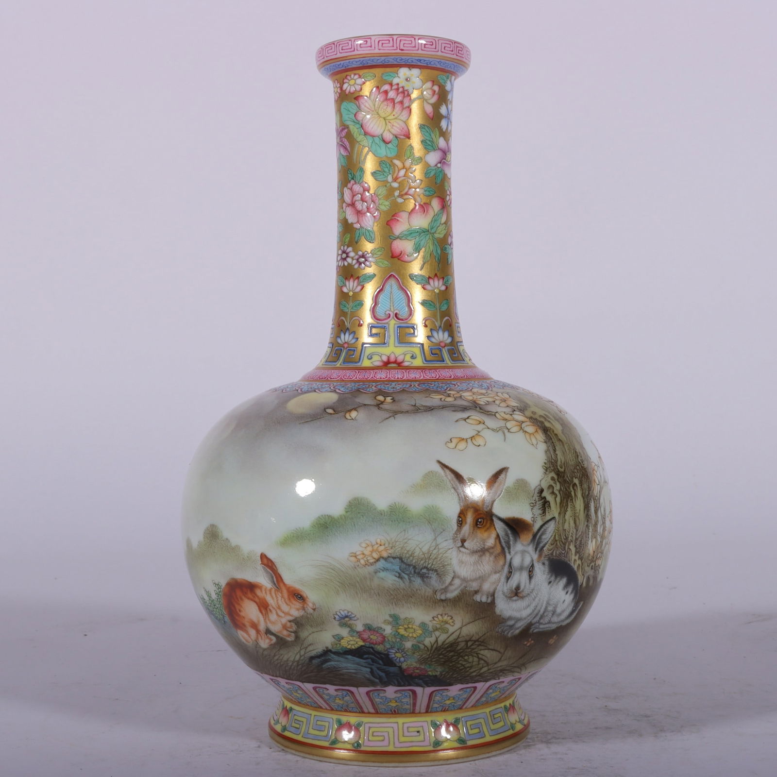 A Exquisite Enamel Gold Ground rabbit Pattern Vase: A Exquisite Enamel Gold Ground rabbit Pattern Vase,Qing Dynasty, China,Qianlong Fourr-character Mark,Size:7.7inx1.7inx4.5inx2.9in 