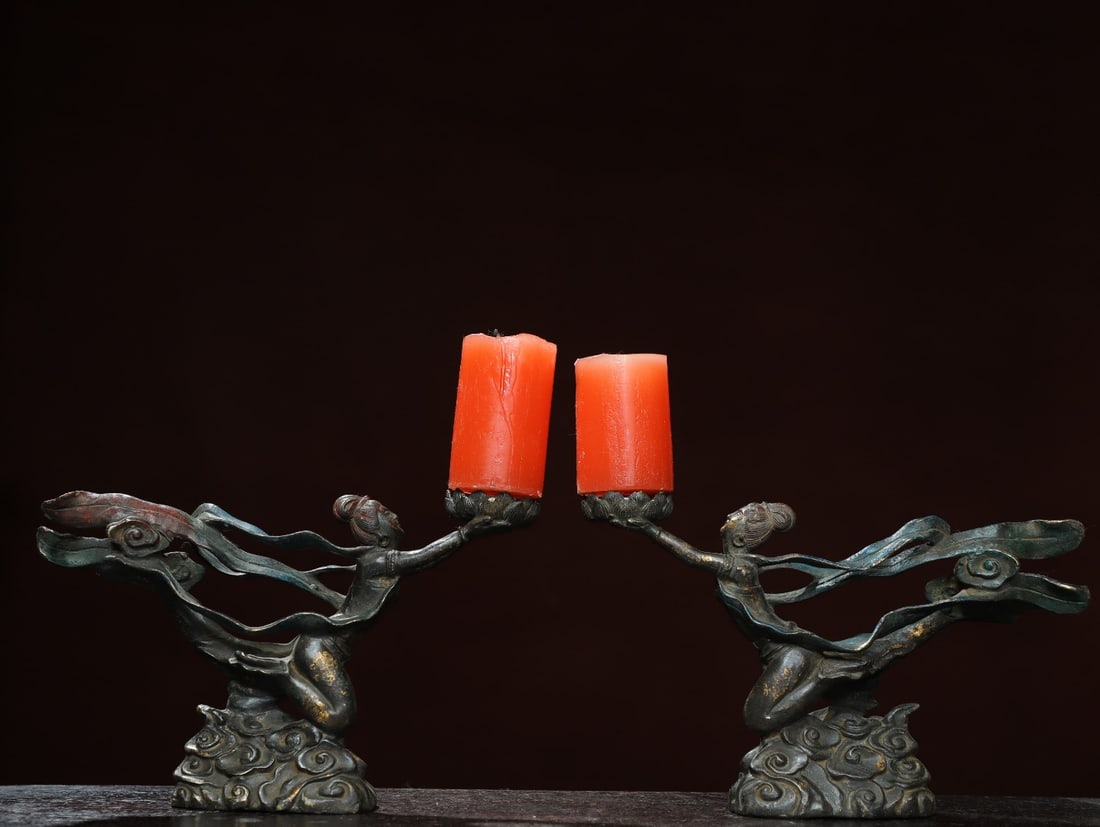 A pair of Exquisite Bronze Human-Shaped Candlestick: A pair of Exquisite Bronze Human-Shaped Candlestick,Tang Dynasty, China,Zhenguan Four-character Mark,Size:6.3inx9.8inx1.8in,Weight:1900g 