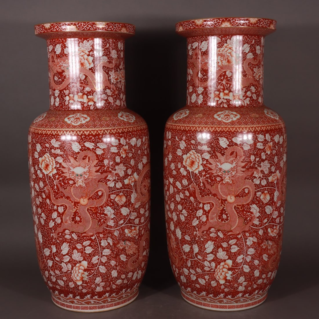 A pair of Exquisite Red Ground Painted Gold Flower and Dragon Pattern Vase: A pair of Exquisite Red Ground Painted Gold Flower and Dragon Pattern Vase,Qing Dynasty, China,Daoguang Six-character Mark,Size:30.3inx10.6inx13.4inx9.8in 一对红地描ŵ