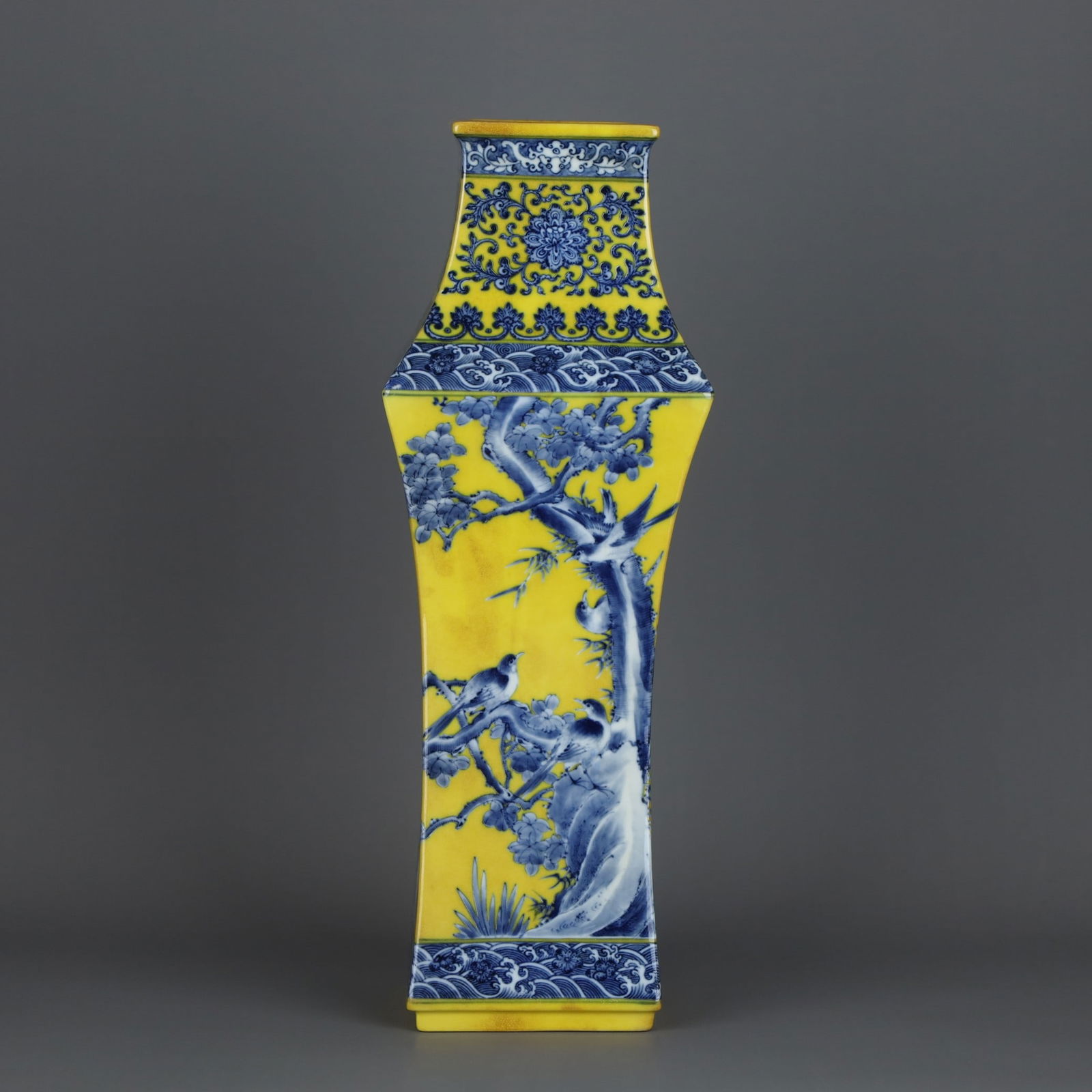 A Exquisite Yellow Glaze Blue and White Flower and Bird Pattern Vase: A Exquisite Yellow Glaze Blue and White Flower and Bird Pattern Vase,Qing Dynasty, China,Qianlong Six-character Mark,Size:16.7inx6.1in 