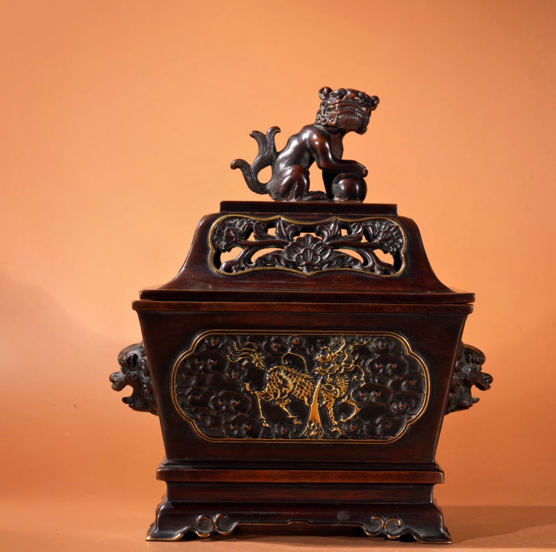 A Exquisite Gilt Bronze Lion-Ears Censer: A Exquisite Gilt Bronze Lion-Ears Censer,Ming Dynasty, China,Xuande Six-character Mark,Size:8.9inx6.5inx4.6in,Weight:5325g 