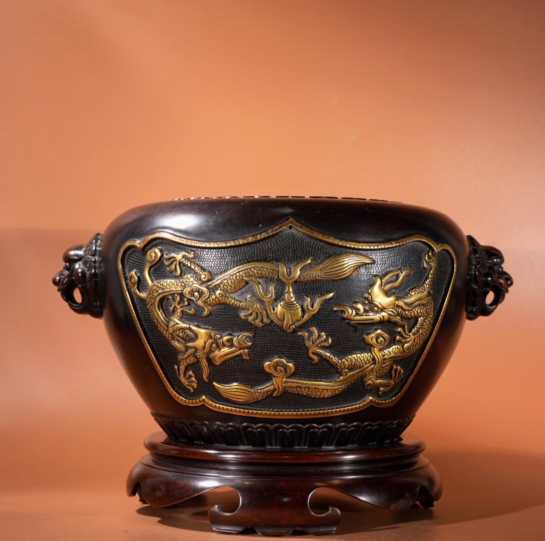 A Exquisite Gilt Bronze Lion-Ears Censer: A Exquisite Gilt Bronze Lion-Ears Censer,Ming Dynasty, China,Xuande Six-character Mark,Size:9.1inx5.9in,Weight:15130g 