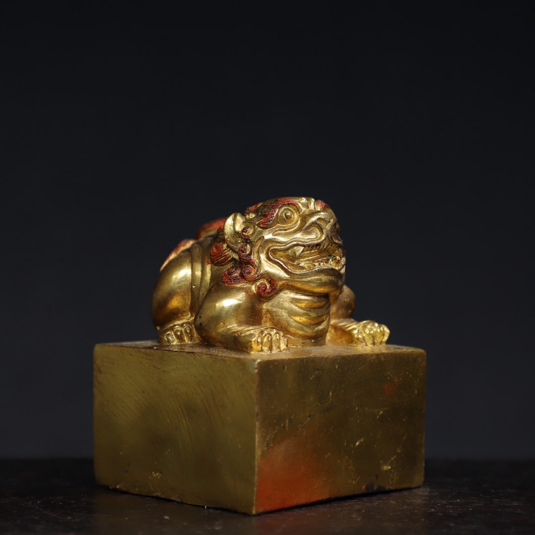 A Exquisite Gilt Bronze Auspicious Beast Seal: A Exquisite Gilt Bronze Auspicious Beast Seal,Qing Dynasty, China,Size:4.1inx3.3inx3.3in,Weight:1250g 铜鎏金瑞兽印章,中国清代