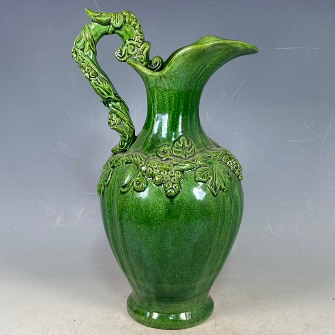 A Exquisite Liao Dynasty Porcelain Single-Color Glazed Carved Inscription Painted Gold Ewer: A Exquisite Liao Dynasty Porcelain Single-Color Glazed Carved Inscription Painted Gold Ewer,Song Dynasty, China,With Mark,Size:11inx5.1in 