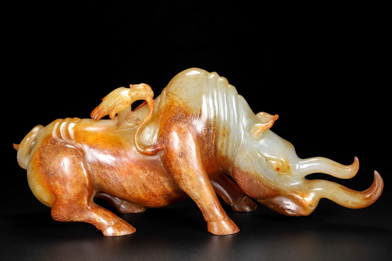 A Exquisite Hotan Jade Rhinoceros Ornament: A Exquisite Hotan Jade Rhinoceros Ornament,Han Dynasty, China 和田玉犀牛,中国汉代