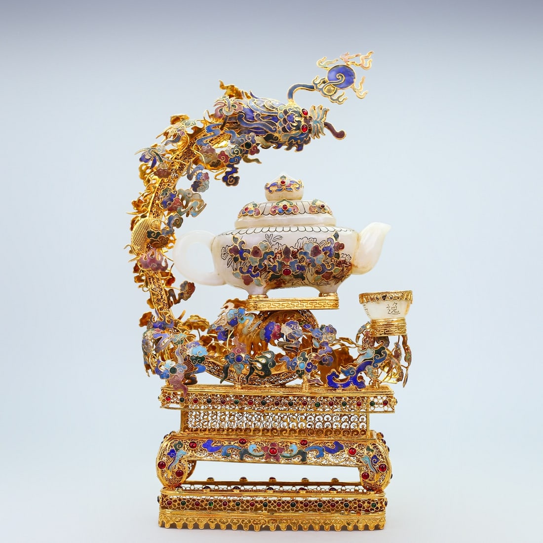 A Set of Exquisite Cloisonne Inlaid Hetian Jade Tea Set: A Set of Exquisite Cloisonne Inlaid Hetian Jade Tea Set,Qing Dynasty, China,Qianlong Four-character Mark,Size:14.2inx8.3inx3in,Weight:1300g 