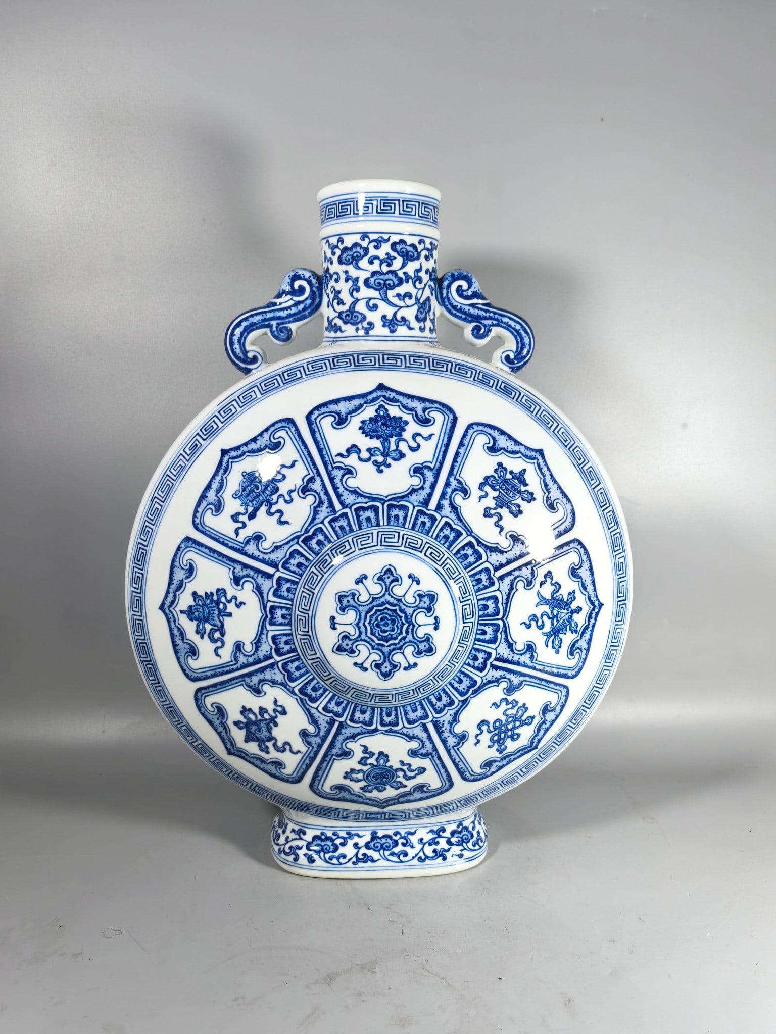 A Exquisite Blue and White Eight Treasures Pattern Double-Ears Vase: A Exquisite Blue and White Eight Treasures Pattern Double-Ears Vase,Qing Dynasty, China,Qianlong Six-character Mark,Size:19.9inx3.4inx14.6inx6.7in 