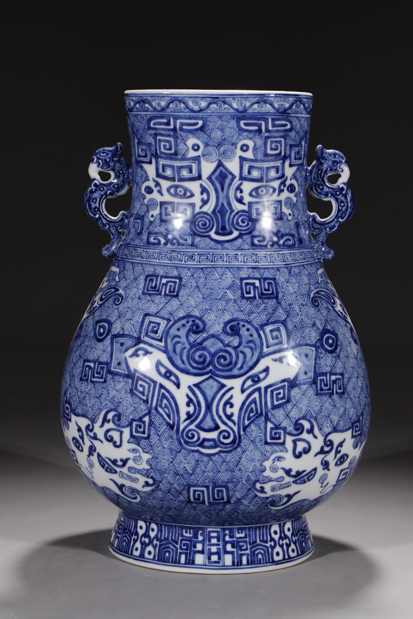 A Exquisite Blue and White Beast-Face Pattern Beast-Ears Vase: A Exquisite Blue and White Beast-Face Pattern Beast-Ears Vase,Qing Dynasty, China,Qianlong Six-character Mark,Size:15.4in 