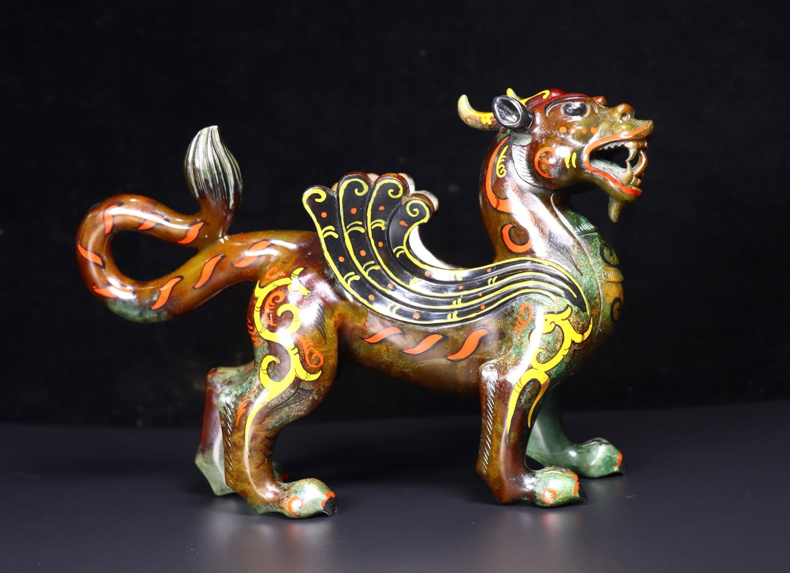 A Exquisite Hetian Jade Auspicious Beast Ornament: A Exquisite Hetian Jade Auspicious Beast Ornament,Han Dynasty, China,Size:10.2inx3.1inx6.7in,Weight:2000g 和田玉瑞兽摆件,中国汉代