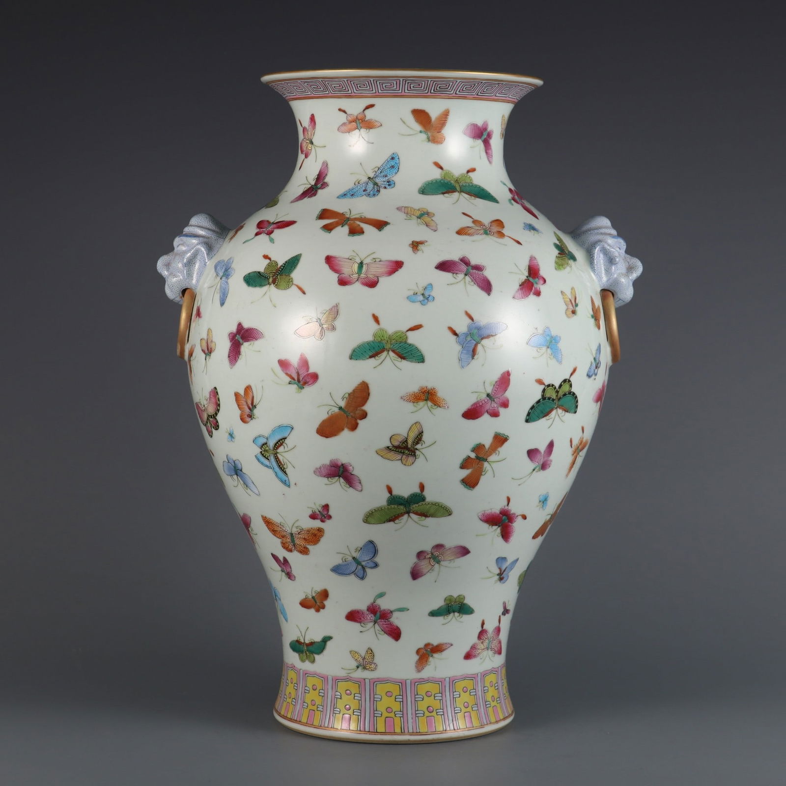 A Rare Famille Rose Hundred Butterflies Pattern Double Beast Ear Vase: A Rare Famille Rose Hundred Butterflies Pattern Double Beast Ear Vase,Qing Dynasty, China,Qianlong Six-character Mark,Size:15.8inx9.4in 