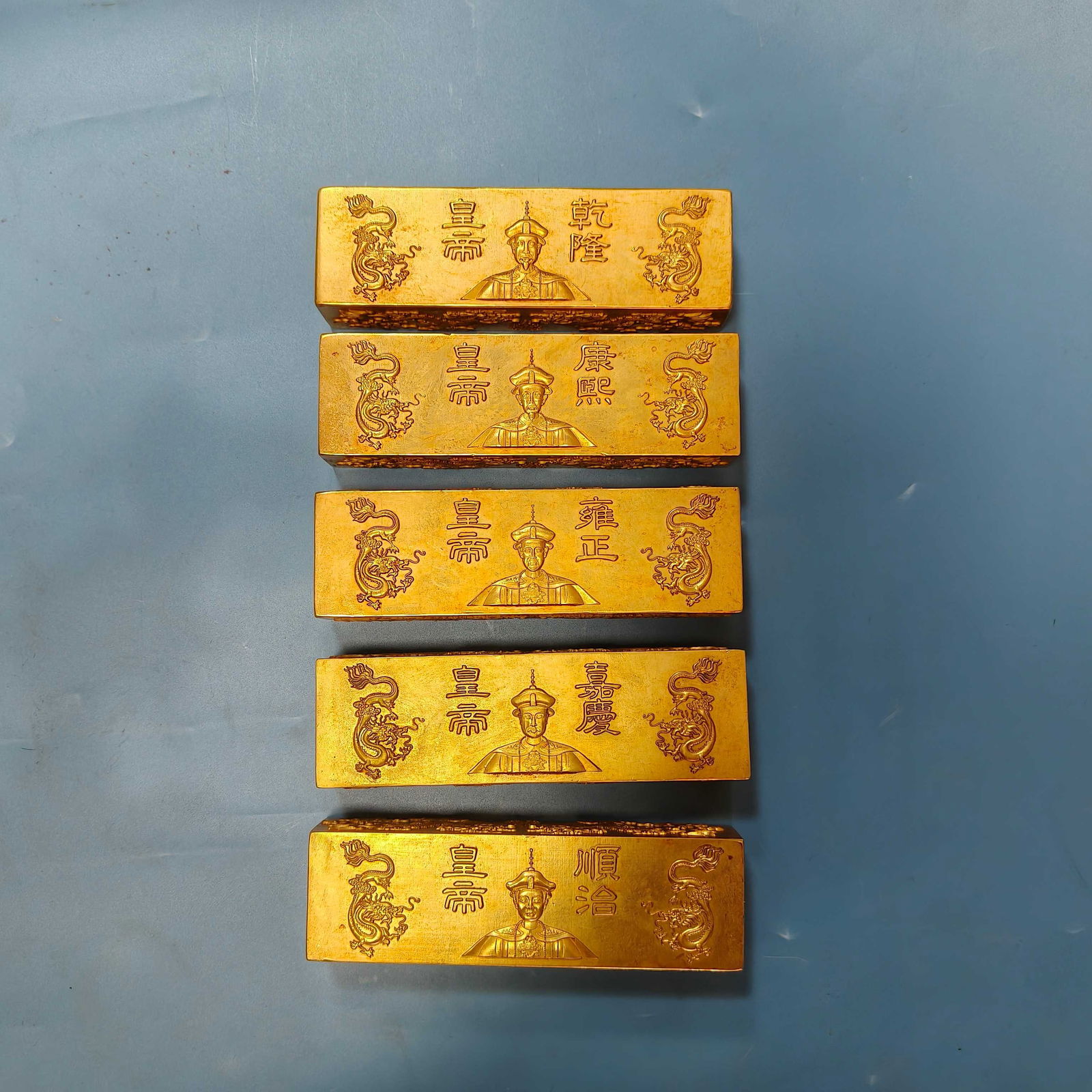 A Set of Exquisite Bronze Gilt Human Pattern Gold Bar (1 of 3)