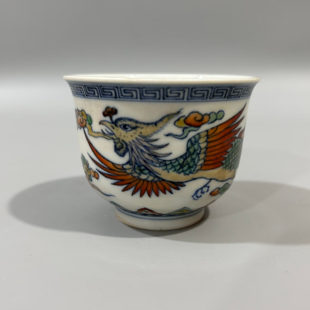 A Exquisite Blue and White Underglaze-Red Phoenix Pattern Cup: A Exquisite Blue and White Underglaze-Red Phoenix Pattern Cup,Qing Dynasty, China ,Yongzheng Six-character Mark,Size:2.6inx3.1in 青花釉里红凤纹杯,ߑ