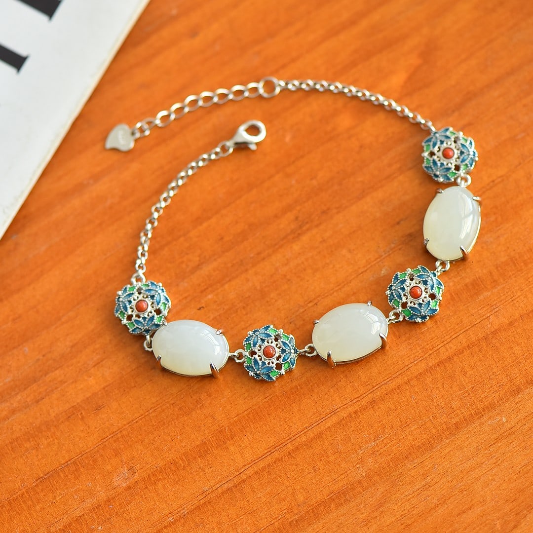A Exquisite Silver Inlaid Hotan Jade Flower-patterned Bracelet: A Exquisite Silver Inlaid Hotan Jade Flower-patterned Bracelet,Size:0.4inx0.6in 银镶和田玉花卉手链