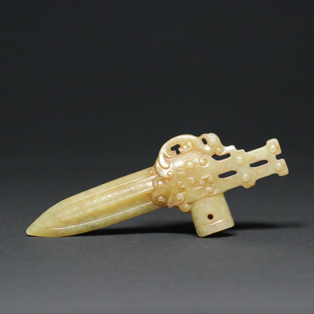 An Exquisite White Jade Sword Ornament (1 of 9)