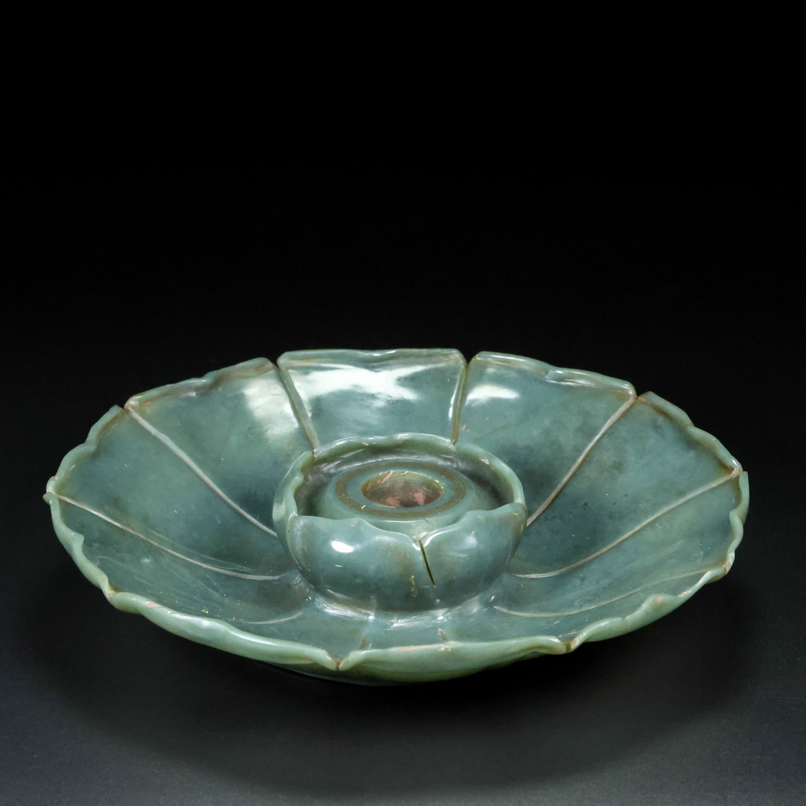 An Exquisite Jasper with poem Lotus-Shaped Candlestick: An Exquisite Jasper with poem Lotus-Shaped Candlestick Qing Dynasty, China Qianlong Four-character Mark Size:1.8inx7.9in Weight:566g碧玉莲花形香插