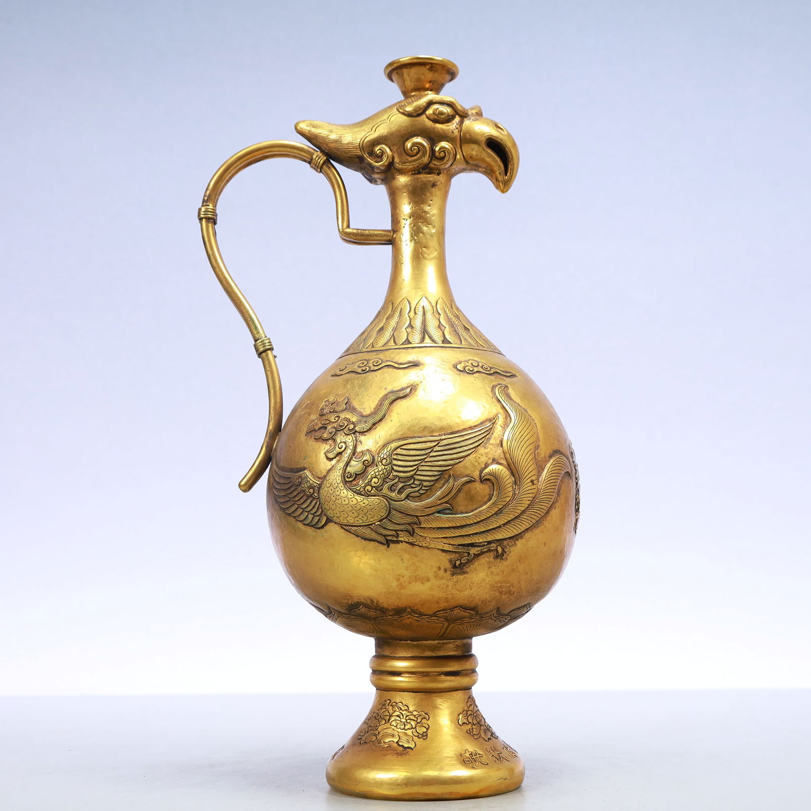 A Exquisite Gilt Bronze Phoenix Pattern Flower Pattern -With Inscription Ewer: A Exquisite Gilt Bronze Phoenix Pattern Flower Pattern -With Inscription Ewer Ming Dynasty, China Size:5.9inx12.6in Weight:950g铜鎏金凤纹花卉纹带&