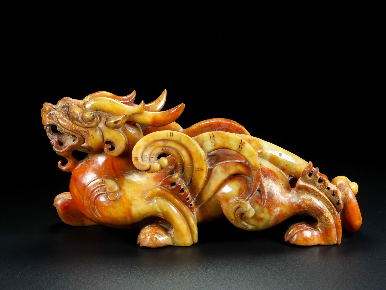 An Exquisite White Jade Auspicious Beast Ornament (1 of 9)