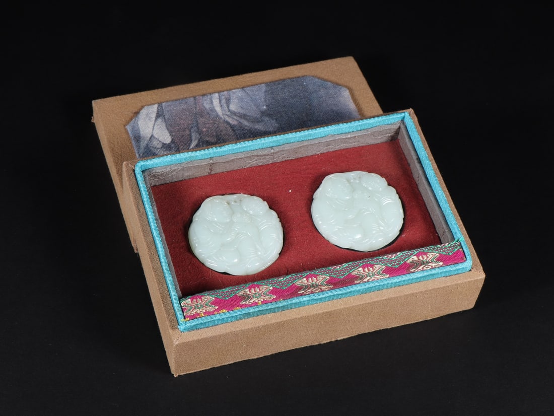 A Pair of Exquisite White Jade Character and Story Pattern Brand: A Pair of Exquisite White Jade Character and Story Pattern Brand Qing Dynasty, China Diameter Size:1.9inx0.5in