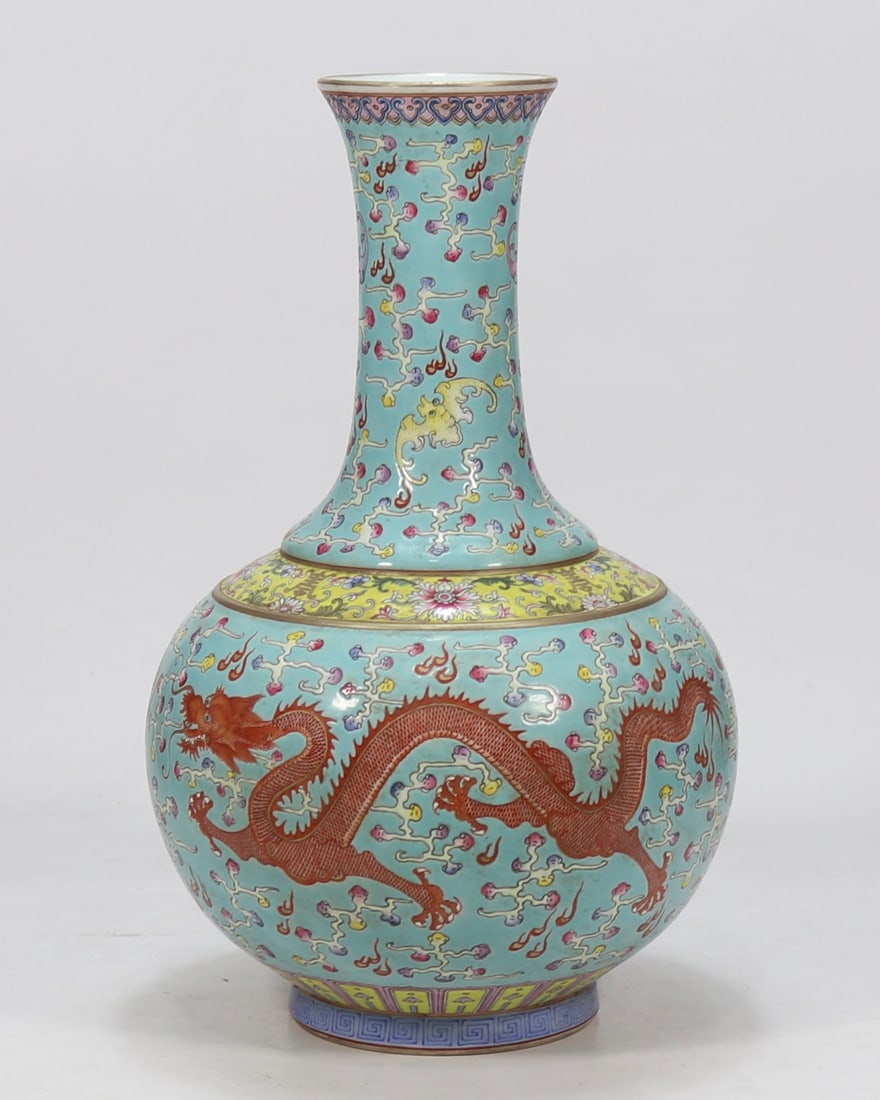 An Exquisite Iron-Red Green Ground Dragon Pattern Lotus Pattern Vase: An Exquisite Iron-Red Green Ground Dragon Pattern Lotus Pattern Vase Qing Dynasty, China Guangxu Six-character Mark Size:15.6inx3.9in松石绿地矾红双龙