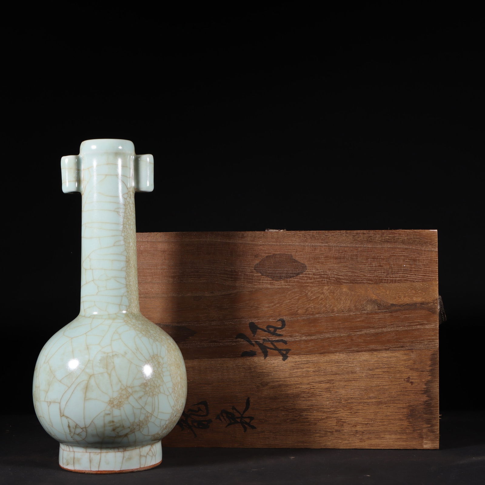 An Exquisite Longquan yao Double-Ears Vase: An Exquisite Longquan yao Double-Ears Vase Song Dynasty, China Size:9.8inx4.7in龙泉窑贯耳瓶 中国宋代 Size:25cmx12cm