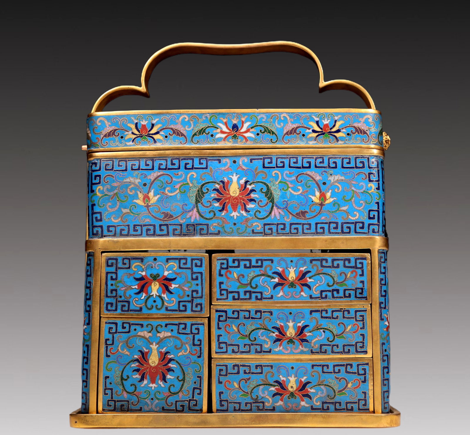 An Exquisite Cloisonne 'Figure& Scrolling Lotus' Box With An Overhead Handle: An Exquisite Cloisonne 'Figure& Scrolling Lotus' Box With An Overhead Handle. Enamaled with polychrome patterns, all reserved on a bright turquoise ground. Chinese Qing Dynasty. Qianlong Six-Character