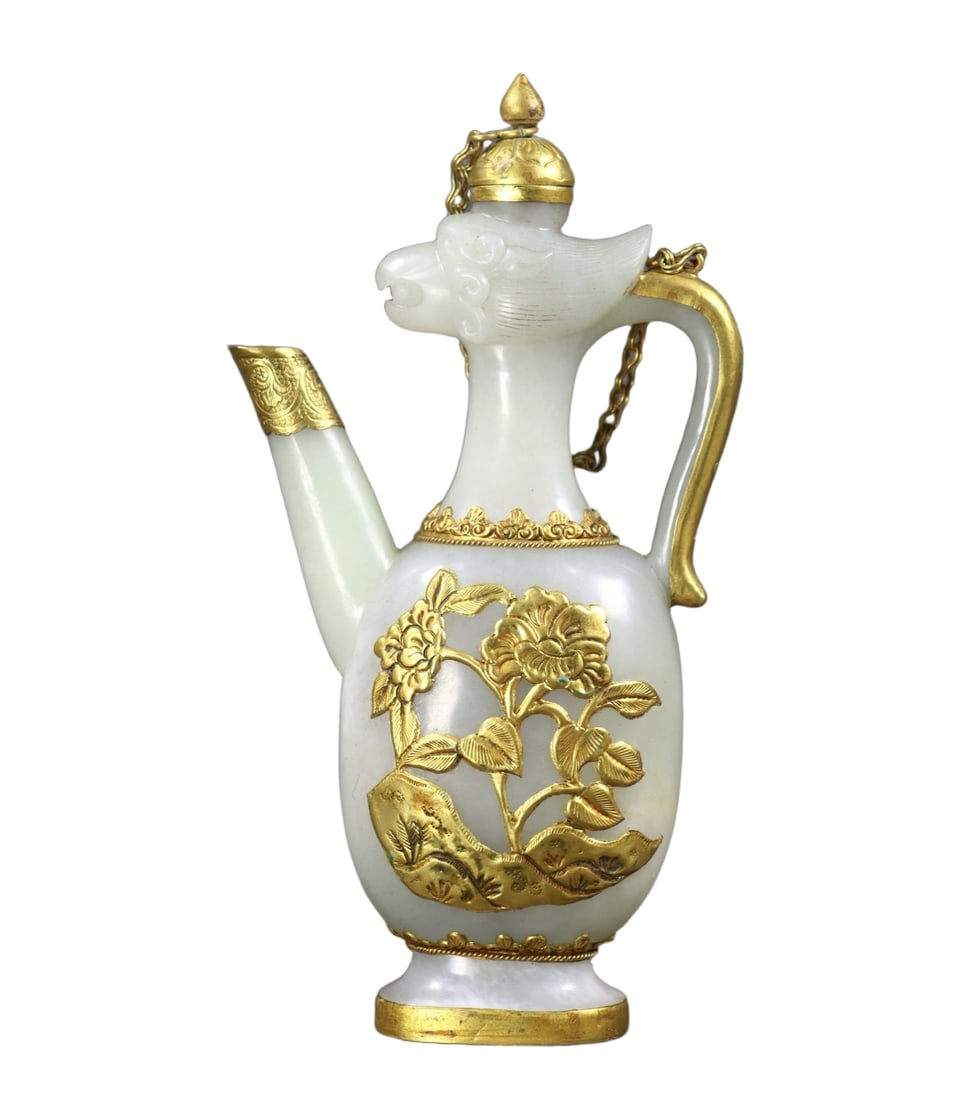 An Exquisite White Jade Cover with Gold Flower Pattern Phoenix-head Ewer: An Exquisite White Jade Cover with Gold Flower Pattern Phoenix-head Ewer,Qing Dynasty,China,Size:6.3inx3.1inx1.6in,Weight:267g 白玉包金花卉纹凤首&