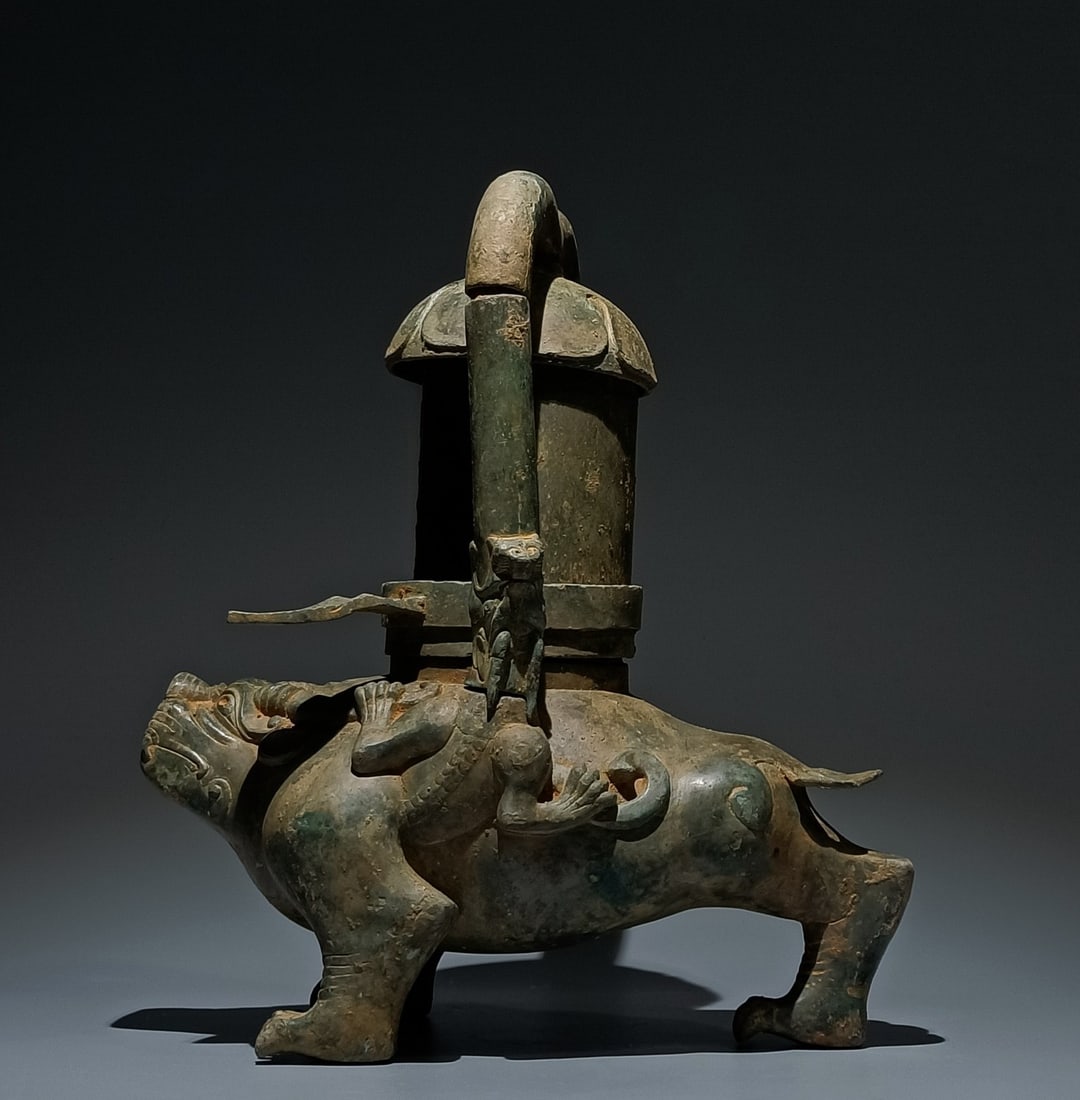 An Archaic Bronze Auspicious Beast-Shaped Palace Lantern (1 of 9)