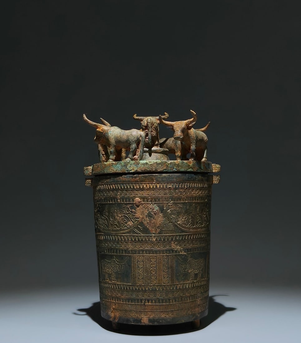 An Archaic Bronze Figure Buffalo Pattern Tripod Ornament: An Archaic Bronze Figure Buffalo Pattern Tripod Ornament,Han Dynasty, China,Size:9.8inx5.5in 