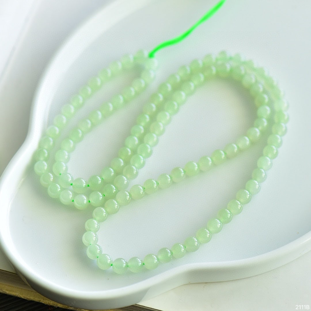 An Exquisite Greenish Jade Bracelets (1 of 4)