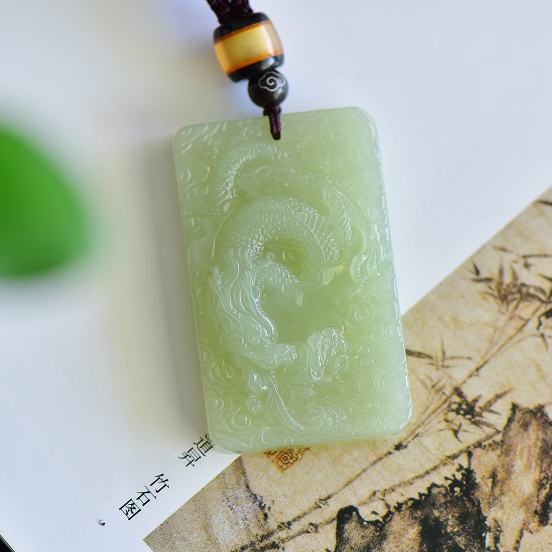 An Exquisite Greenish Jade Auspicious Cloud and Dragon Pattern Pendant: An Exquisite Greenish Jade Auspicious Cloud and Dragon Pattern Pendant,Size:31mmx50mm 寓意:龙牌 龙行天下龙腾四海 青白