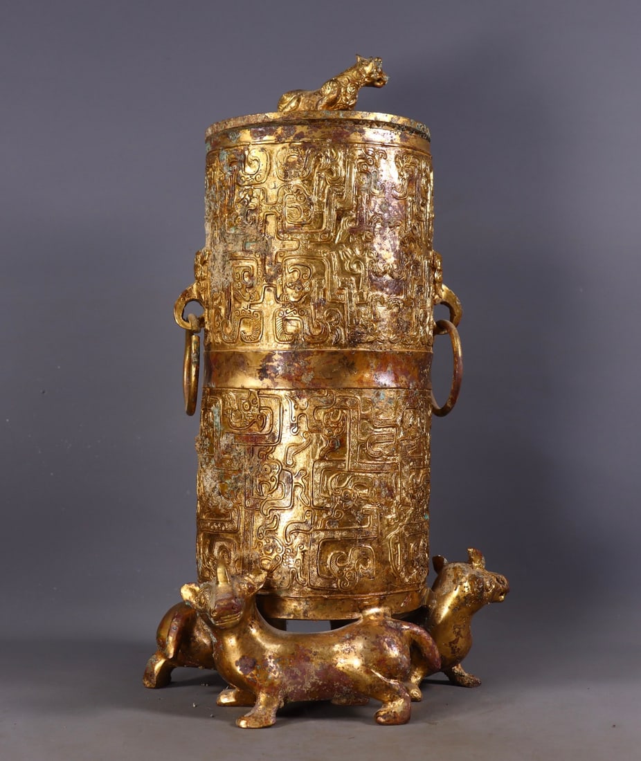 A Rare Gilt Bronze Chi-Dragon Pattern Double-Ears and Tripod Cover Jar: A Rare Gilt Bronze Chi-Dragon Pattern Double-Ears and Tripod Cover Jar,the Warring States period in China,Size:14.6inx8.3in,Weight:4461g 铜鎏金螭龙纹双耳