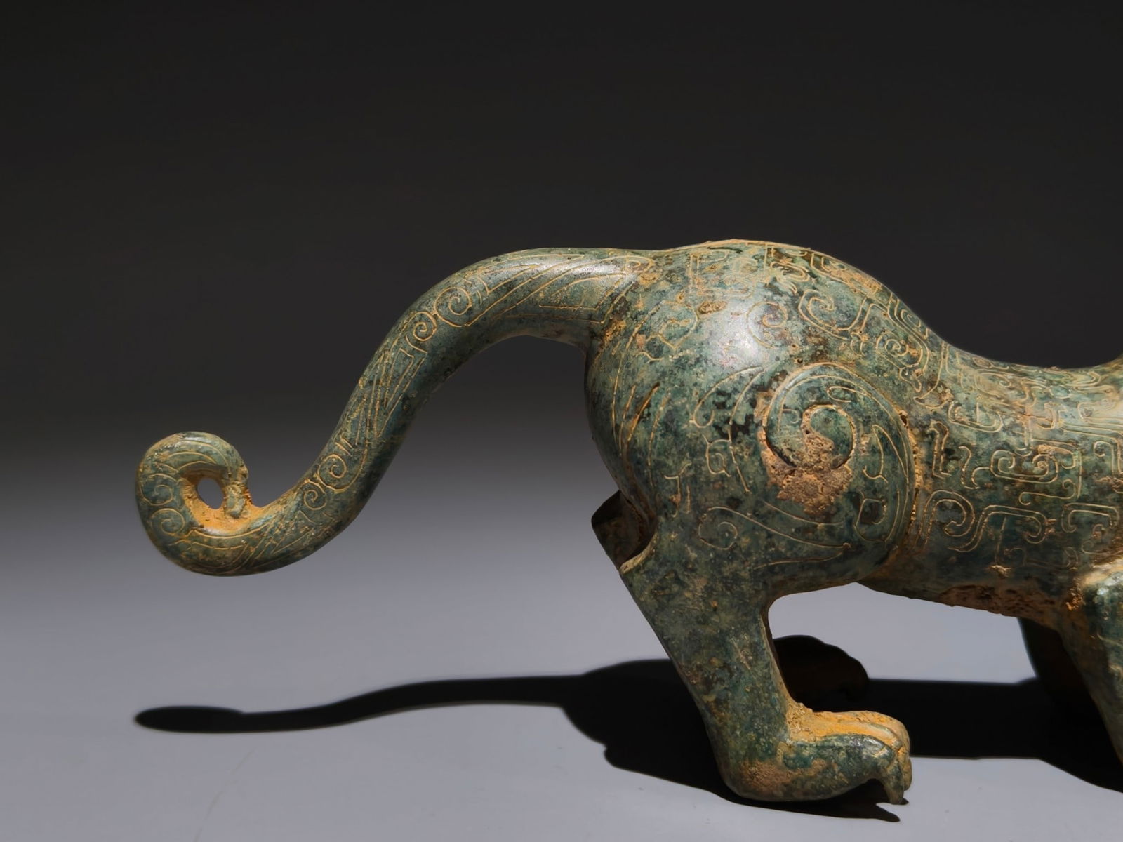 An Archaic Bronze Cloud Pattern Auspicious Beast Ornament - 3