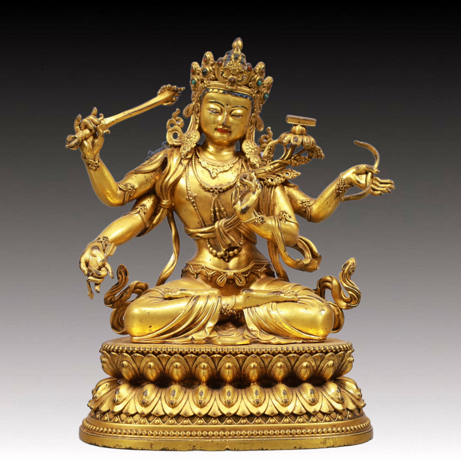 A Solemn Gilt Bronze Four-arms Statue of Manjusri, Inlaid Gems (1 of 7)