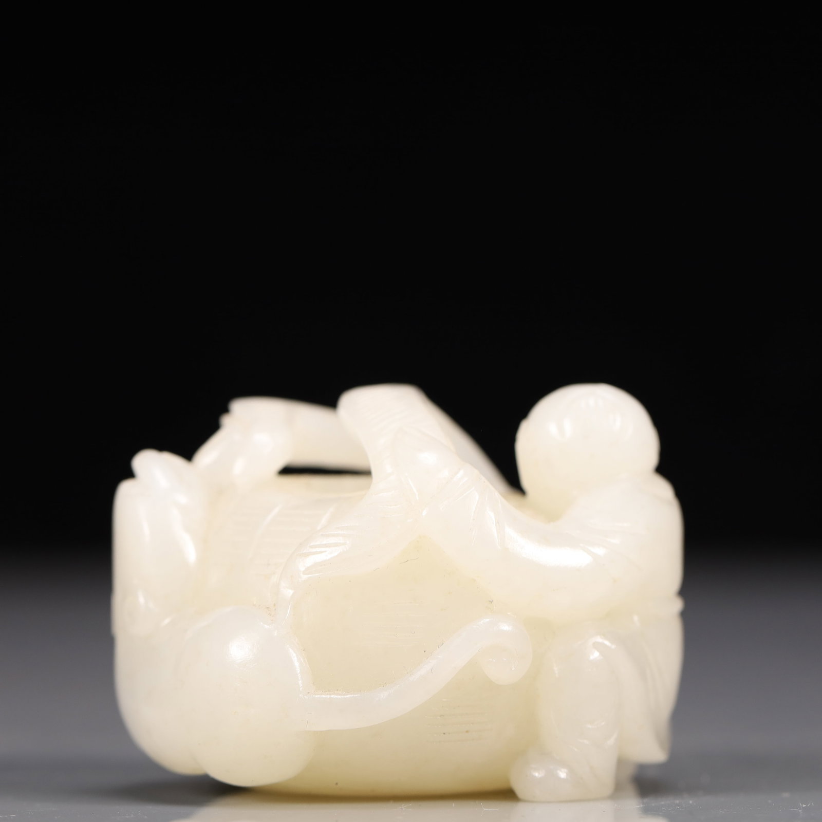 An Exquisite White Jade Figure Pattern Brush Washer (1 of 6)