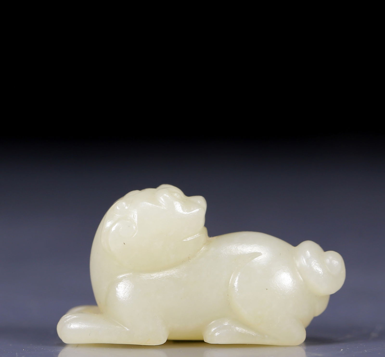 An Exquisite White Jade Dog Ornament (1 of 5)