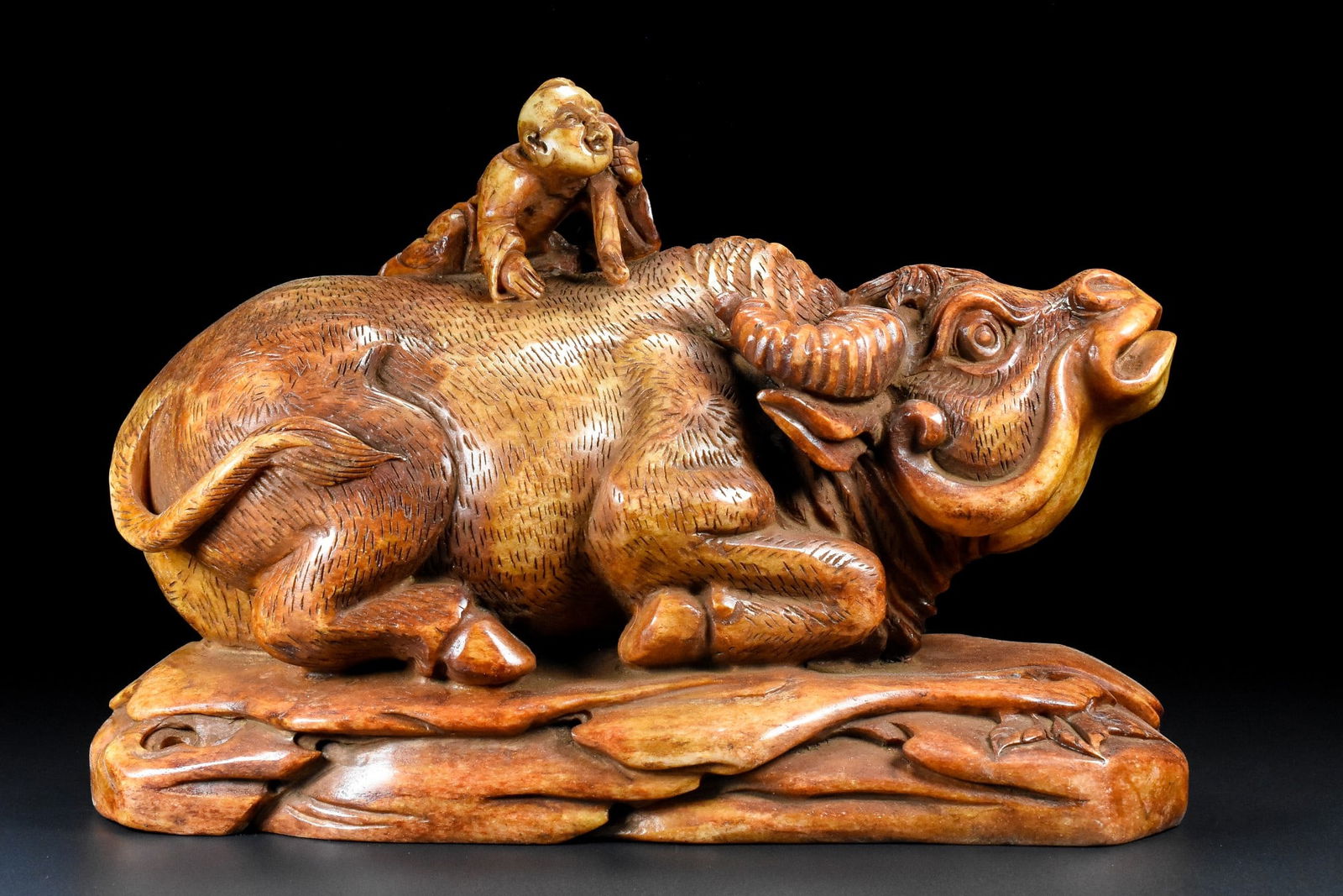 An Exquisite Archaic Jade Figure Riding Buffalo Ornament: An Exquisite Archaic Jade Figure Riding Buffalo Ornament,Ancient Time,China,Size:9.8inx7.1inx13in,Weight:15250g 高古玉人物骑牛摆件,中国