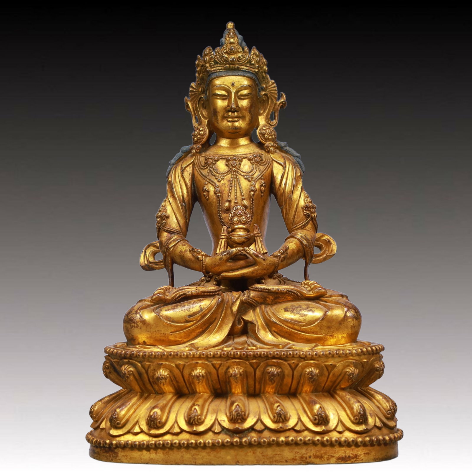 A Solemn Gilt Bronze Statue of Amitayus: A Solemn Gilt Bronze Statue of Amitayus,Qing Dynasty, China,Size:6.3inx4.3inx9.4in,Weight:2450g 铜鎏金无量寿佛像,中国清代