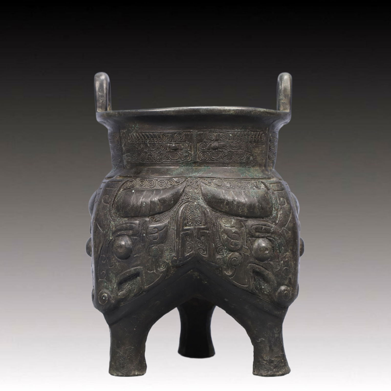 A Precious Bronze Beast-Face Pattern Double-Ears and Tripod Censer: A Precious Bronze Beast-Face Pattern Double-Ears and Tripod Censer,Ancient Time, China,Size:5.1inx8.3in ;Weight:1600g 青铜兽面纹双耳三足香&#