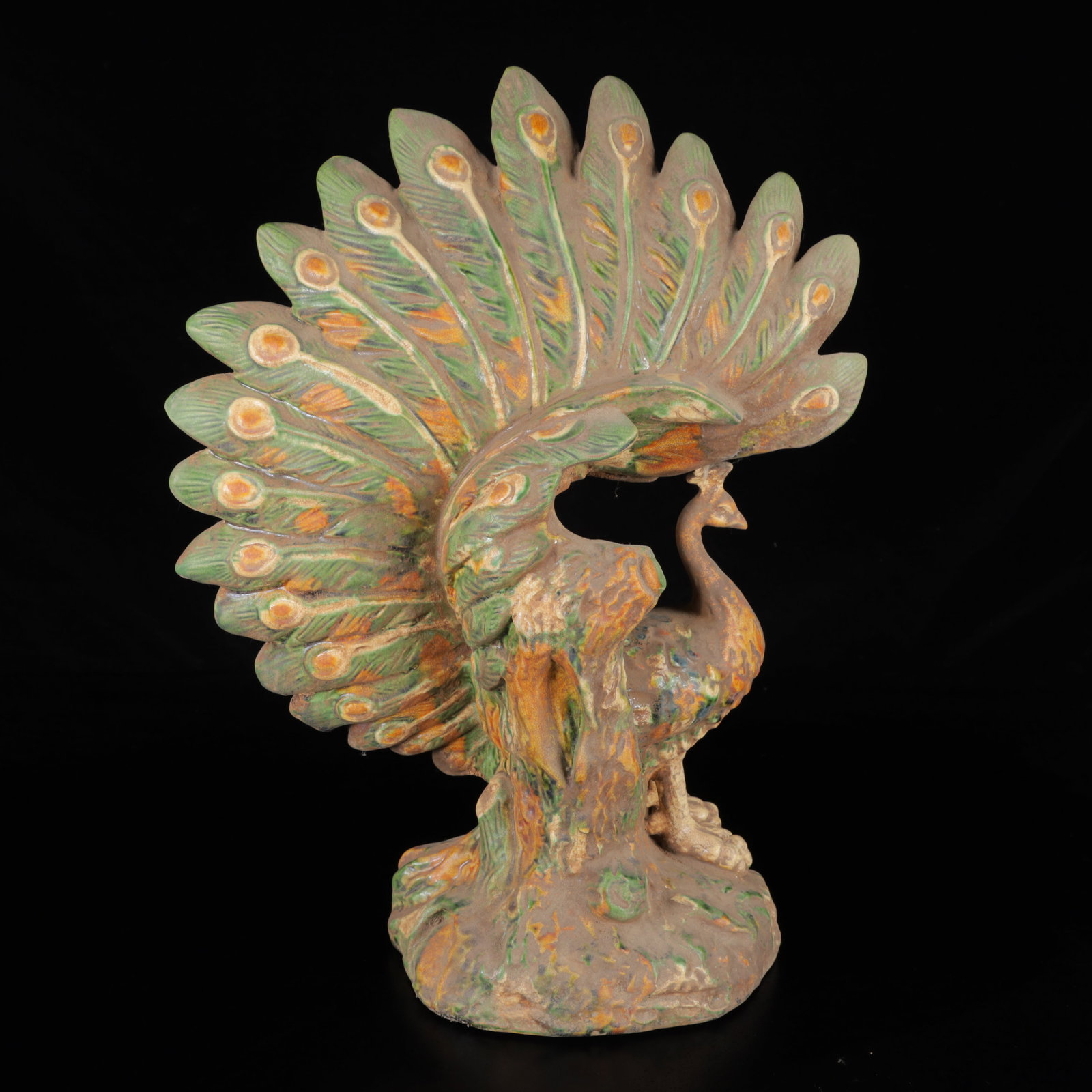 An Exquisite Tang Tri-Color Glazed Pottery Peacock Ornament: An Exquisite Tang Tri-Color Glazed Pottery Peacock Ornament,Tang Dynasty,China,Size:12.2inx9.4inx5.1in,Weight:1260g 