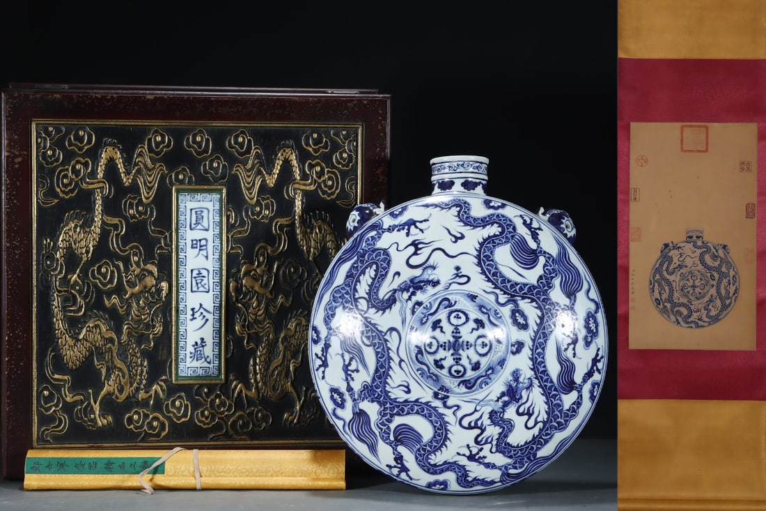 A Huge Blue and White Auspicious Cloud and Dragon Pattern Beast-Ears Pot,with Chinese Vertical: A Huge Blue and White Auspicious Cloud and Dragon Pattern Beast-Ears Pot,with Chinese Vertical Scroll Ink Painting on Silk,Yuan Dynasty,China,Size:(Without Frame)24.6inx13.8in,(Porcelain)17.1inx15.2in