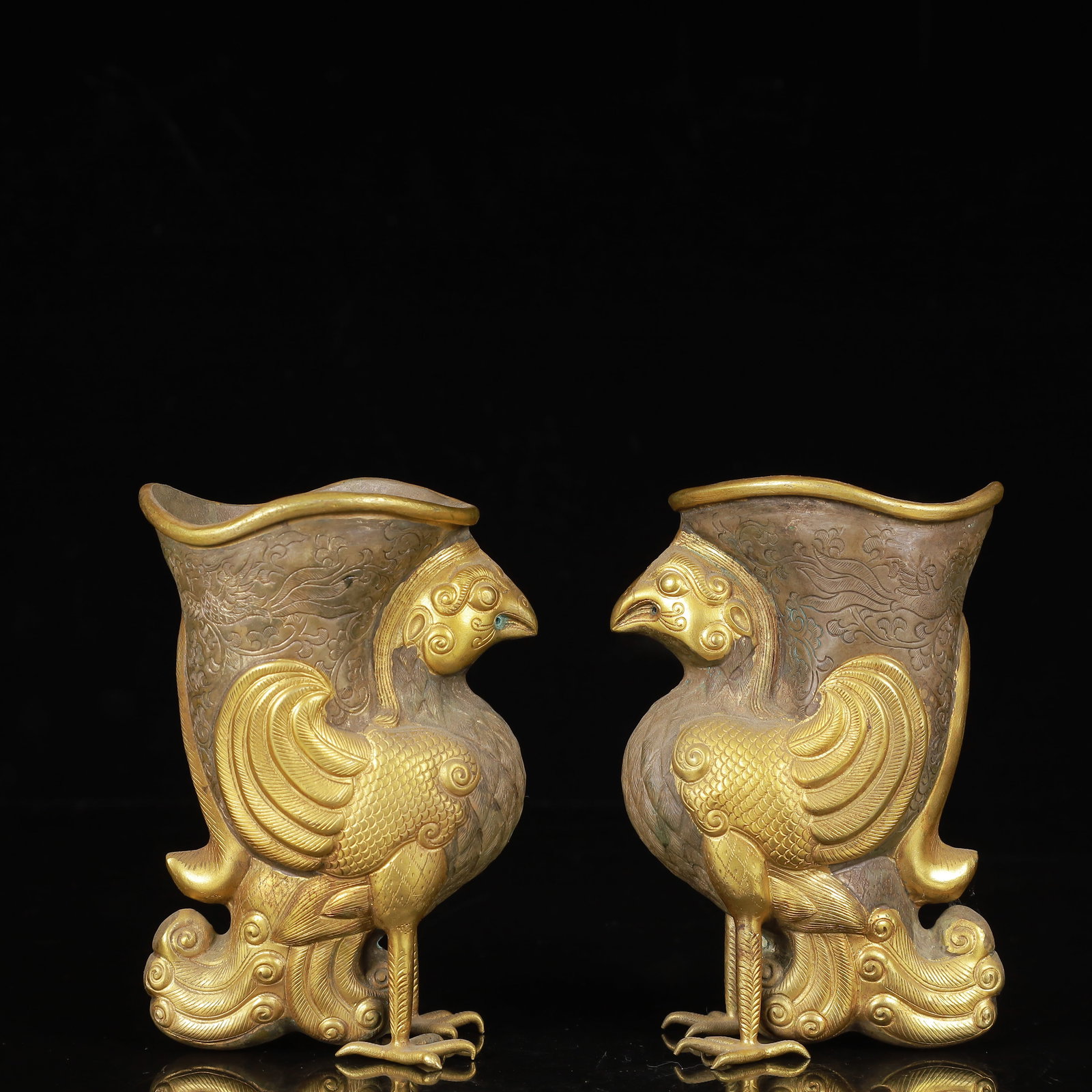 A Pair of Exquisite Gilt Silver Phoenix Cups: A Pair of Exquisite Gilt Silver Phoenix Cups,Qing Dynasty,China,Size:3.1inx2inx4.3inx2,Weight:750g 一对银鎏金凤杯,中国清代