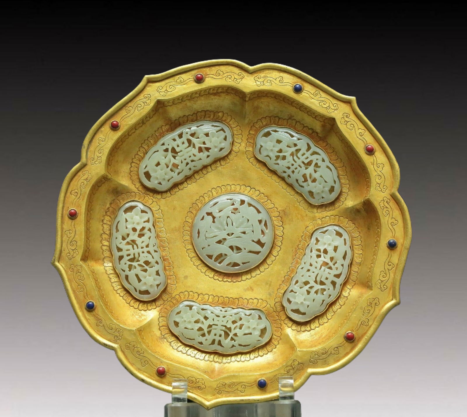 Gilt Bronze Inlaid White Jade 'Lotus' Plate: A Gilt Bronze Inlaid White Jade 'Lotus' Plate. Chinese Qing Dynasty. Size:9.4inx1.6in 清代 铜鎏金嵌白玉花卉纹盘