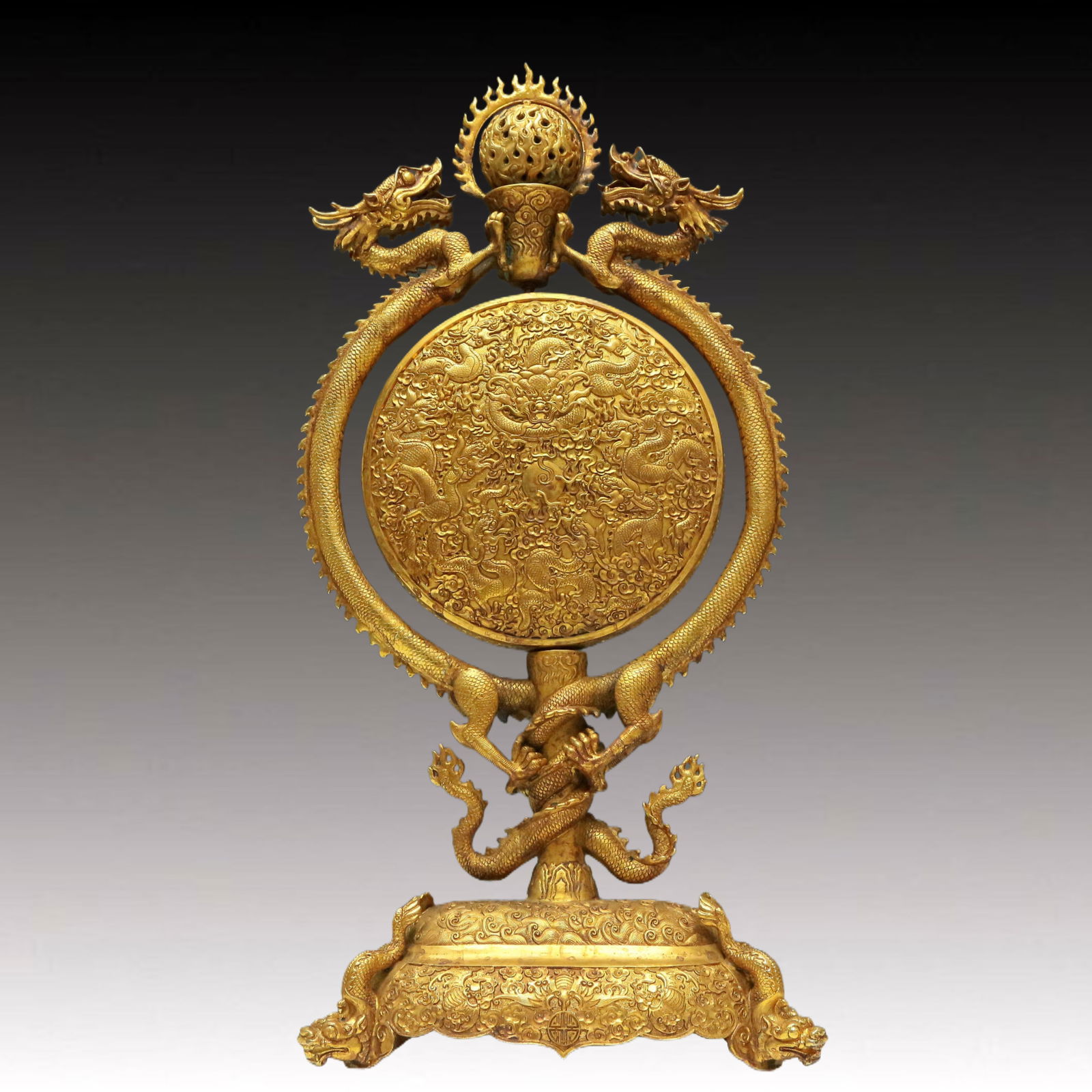 Marvelous Imperial Gilt-Bronze 'Dragon& Auspicious Cloud' Decoration: A Marvelous Imperial Gilt-Bronze 'Dragon& Auspicious Cloud' Decoration. Cast in detail with scaly, sinuous dragons writhing amidst dense clouds. Chinese Qing Dynasty. Qianlong Four-Character Mark. Siz