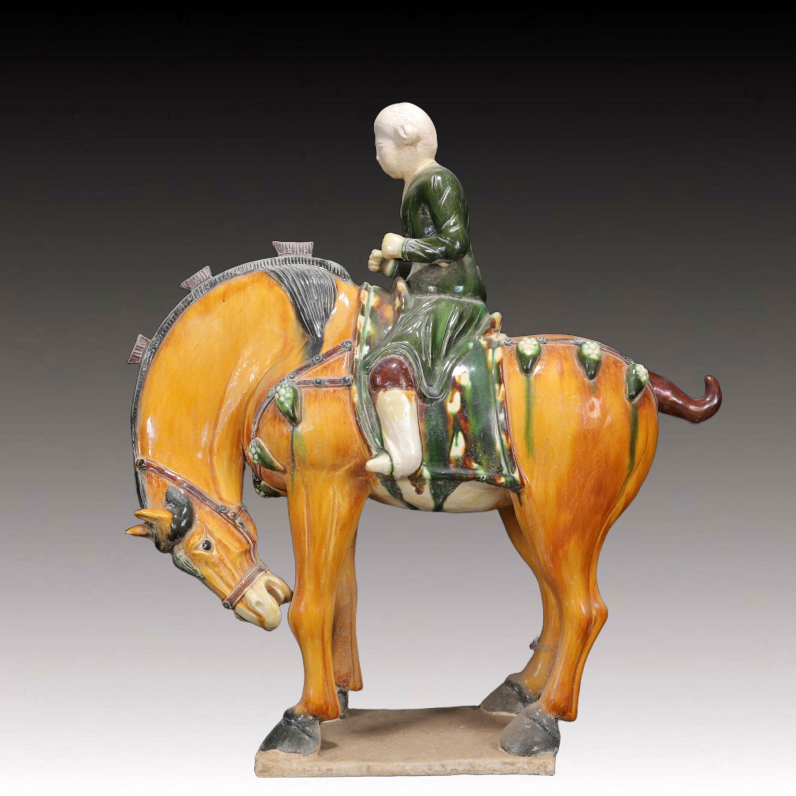 An Rare Tang Tri-Color Glazed Pottery Figure Riding Horse Ornament: An Rare Tang Tri-Color Glazed Pottery Figure Riding Horse Ornament,Tang Dynasty,China,Size:21.3inx6.7inx22.4in,Weight:8450g 唐三彩人物骑马摆件,