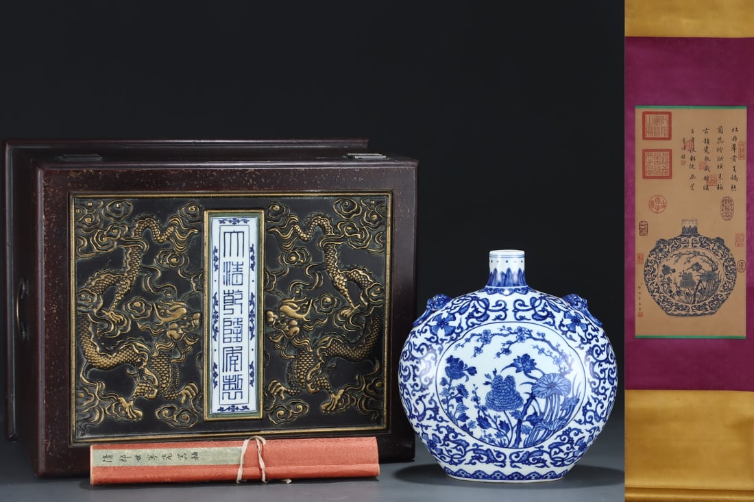 An Exquisite Blue and White Flower Pattern Beast-Ears Vase,with Chinese Vertical Scroll Ink Painting: An Exquisite Blue and White Flower Pattern Beast-Ears Vase,with Chinese Vertical Scroll Ink Painting on Silk,Qing Dynasty,China,Qianlong Six-character Mark,Size:(Without
